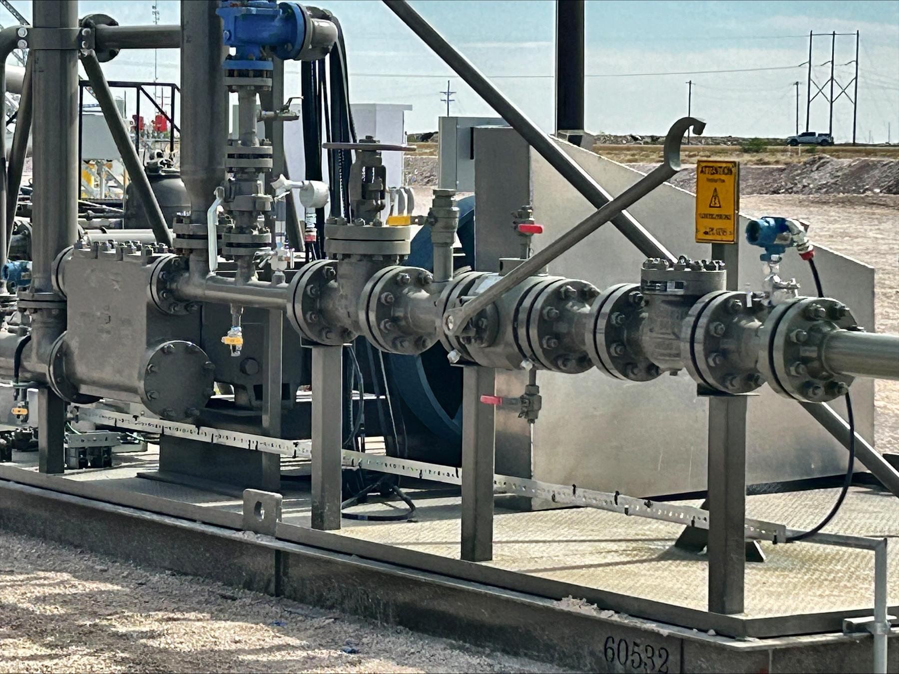 Pump and manifold skid with valves, flanges and instrumentation